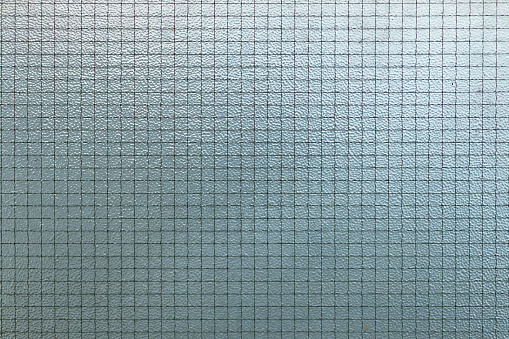 Wire mesh glass or protective safety laminated tempered glass texture pattern for background