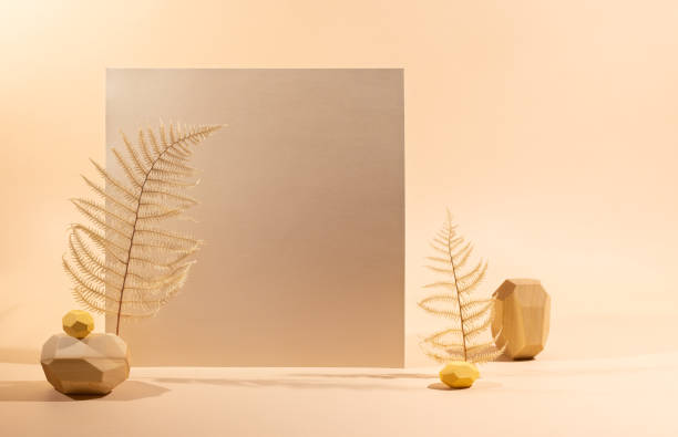 istock Gold Paper sheet or blank card with realistic leaf shadows 1312660774