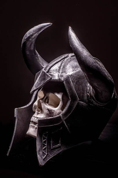 istock Skull wearing horned Helmet on a black background 1312662013