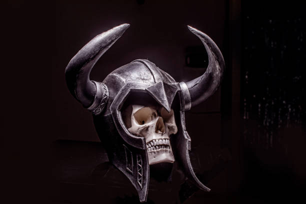 istock Skull wearing horned Helmet on a black background 1312662039