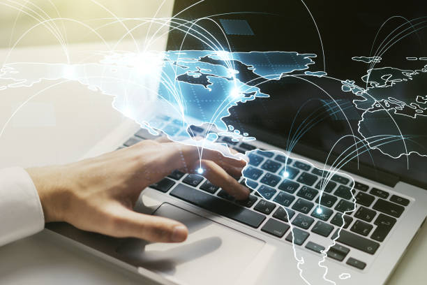istock Double exposure of abstract digital world map with connections and hand typing on computer keyboard on background, big data and blockchain concept 1312663167