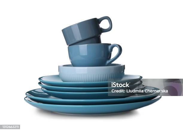 Stack Of Ceramic Dishware On White Background Stock Photo - Download Image Now - Plate, Cut Out, Group Of Objects