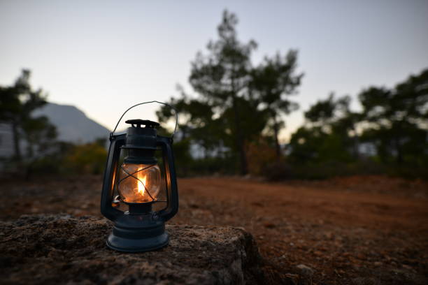 istock A wonderful sunset on the mountain with a kerosene light. 1312667885