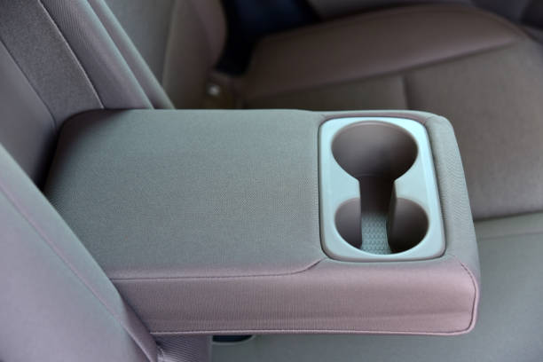 istock Armrest in the car with cup holder for rear seats row 1312670390