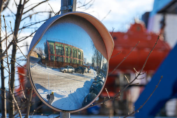 istock Convex mirror of spherical type on pole reflecting road 1312671764