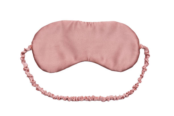 istock pink Sleeping eye mask, isolated on white. Insomn'a solution sleep blackout mask 1312673043