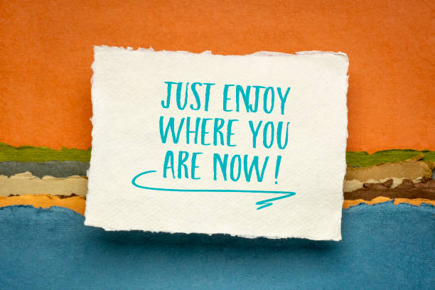 istock just enjoy where you are now - inspirational note 1312673910