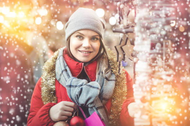 istock Woman posing on Christmas market 1312674082