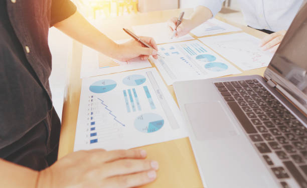 istock Business team analyzing income charts and graphs with modern laptop computer. Close up.Business analysis and strategy. 1312675362