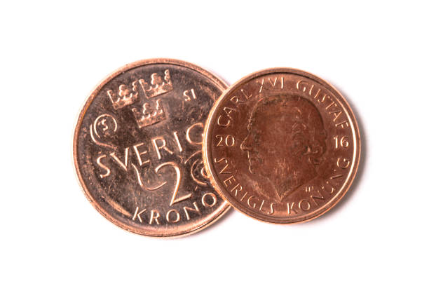 istock Swedish coins on white background 1312677261
