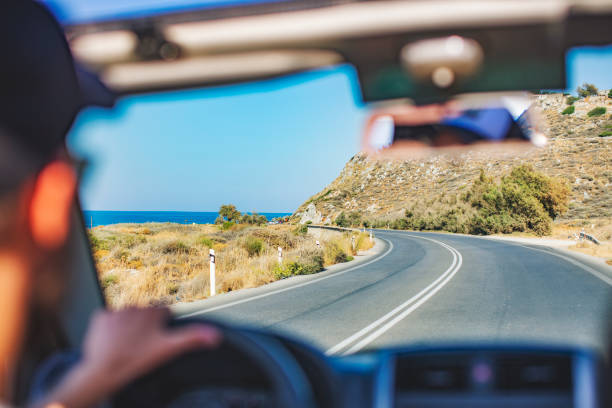 istock Road trip. Father and son travelling together by ca 1312678916