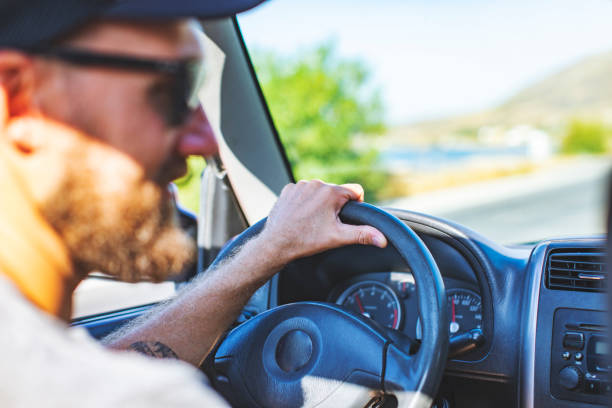 istock Road trip. Father and son travelling together by ca 1312679118