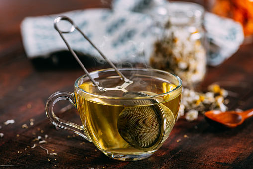Chamomile Tea on Rustic Wooden Background