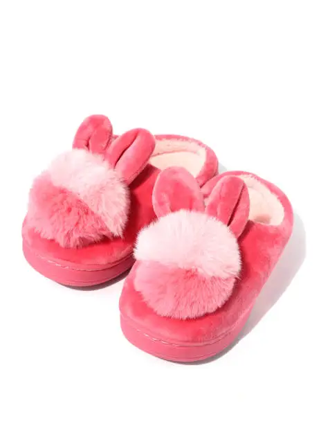 Pink Cute warm fluffy children Bunny Slippers isolated on white background