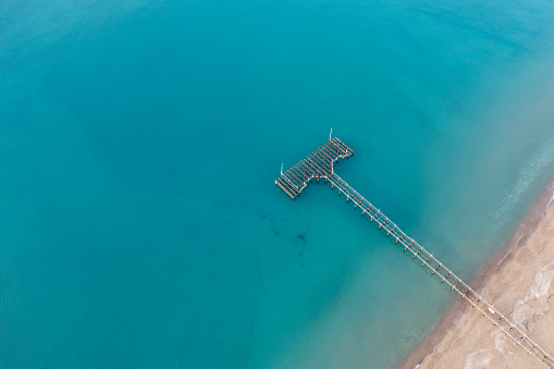 Aerial view of an empty pier. Taken via drone. Antalya, Turkey.