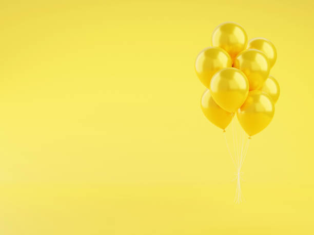 istock Yellow glossy balloons 3d render illustration on background with copy space. 1312680655