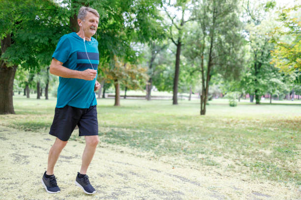 istock Mature fit man exercising outdoors 1312681402