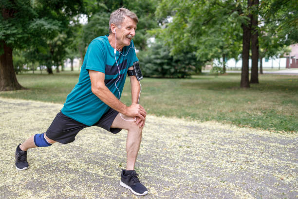 istock Fit mature athlete doing leg exercises 1312681414
