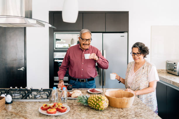 istock Senior couple preparing breakfast 1312684170