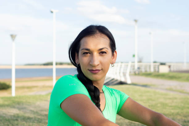 transgender girl doing sport on the outdoor beach transgender person photos stock pictures, royalty-free photos & images