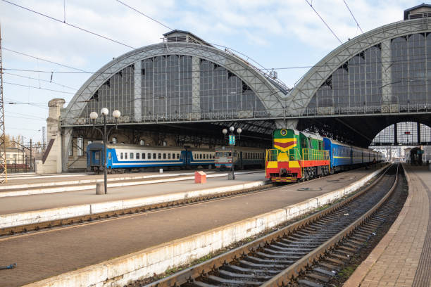 istock trains at railway station 1312685356