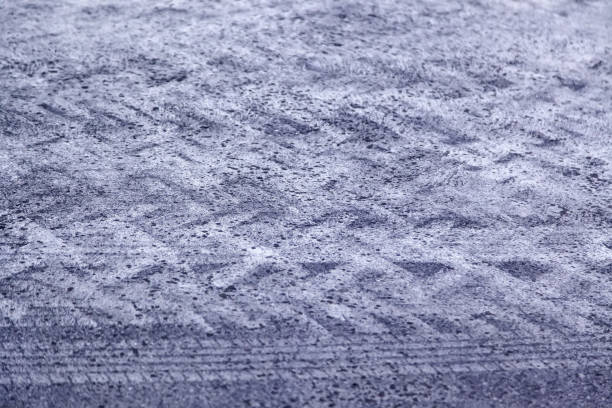 istock Wheel tracks on street 1312687492