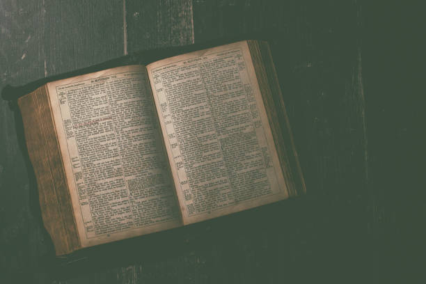 istock Top view of an old open Bible 1312687968