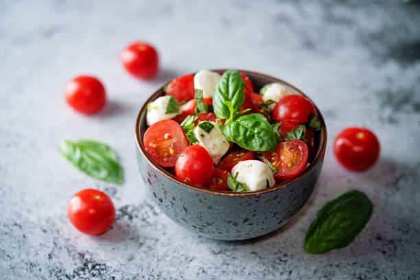 istock Tomato Basil mozzarella salad in a bowl 1312691744