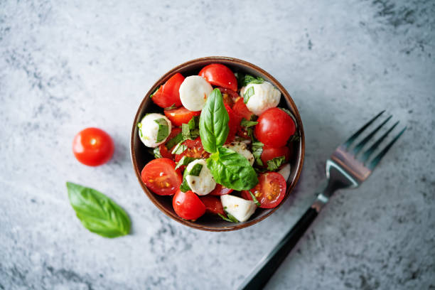istock Tomato Basil mozzarella salad in a bowl 1312691769