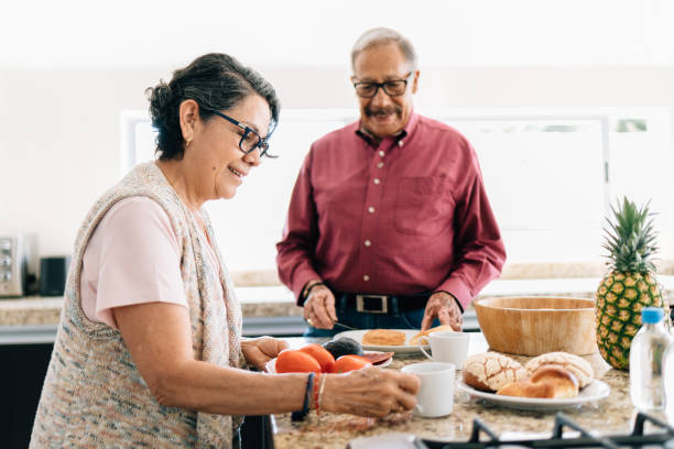 istock Senior couple preparing breakfast 1312693275