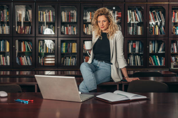 istock Businesswoman using a laptop in her office 1312694445