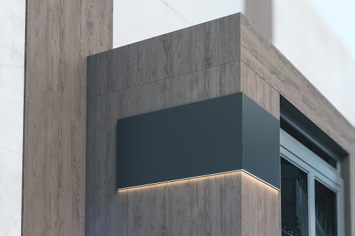 Cartel negro con espacio de copia y retroiluminación en la esquina de edificio de madera de estilo ecológico cerca de la entrada, renderizado 3D, maqueta photo