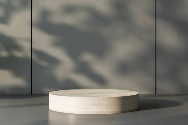 istock Light wooden round stand with copyspace on glossy surface at sunset wall background. 3D rendering, mockup 1312699526