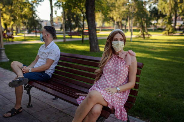 istock A young married couple keeps their distance outdoors 1312703447