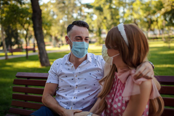 istock A young married couple keeps their distance outdoors 1312704377