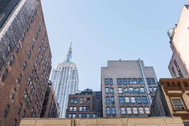 istock Weathered apartment buildings near skyscraper 1312708789