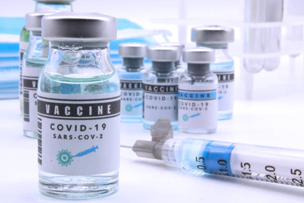 istock Vaccine vials next to a syringe 1312711978