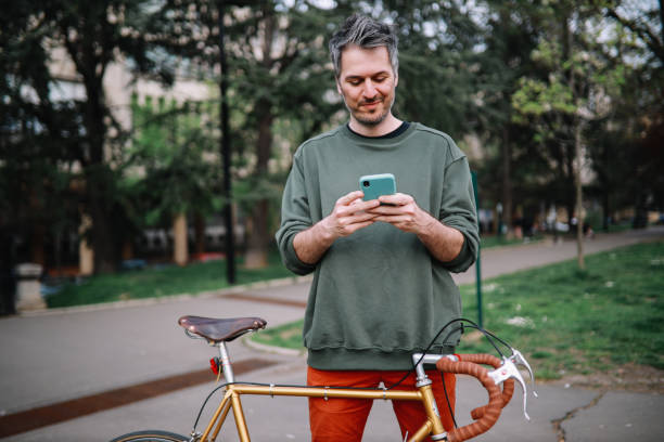 istock Young man checking his phone 1312712510