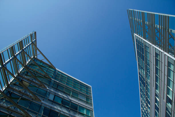 istock Financial Buildings Reflecting with Sunshine and Blue Sky 1312713609