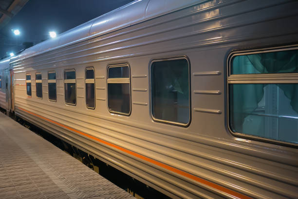 train car on the platform, the red car of the electric train