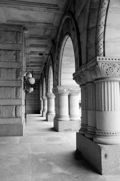 Black and White of Decorative Columns and Arches on Building