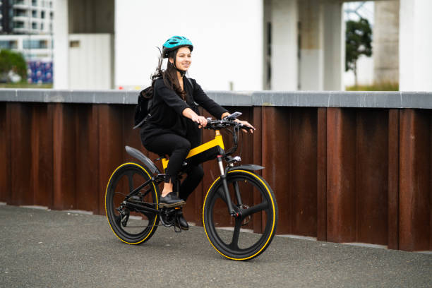 istock Young woman cycling. 1312730359