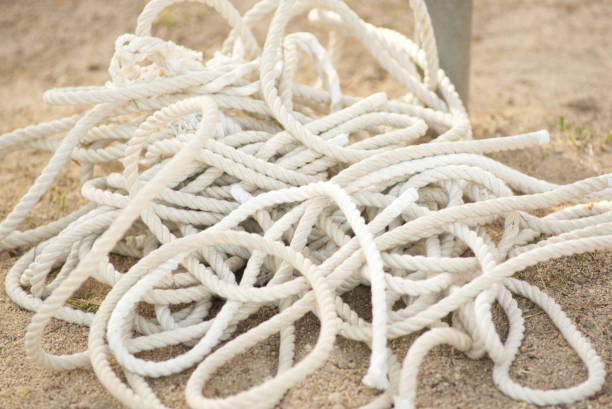 Free Stock Photo of Tangled pile of white ropes on ground | Download ...