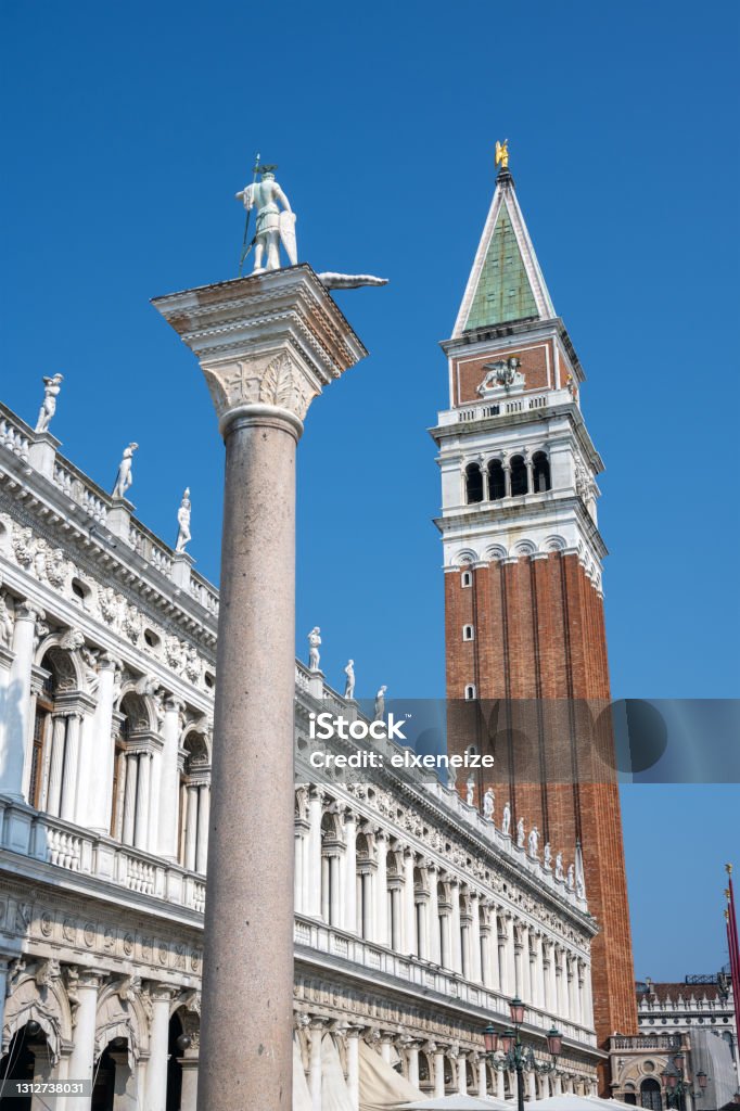The Campanile and the Marciana Library The Campanile and the Marciana Library, seen in Venice, Italy Architectural Column Stock Photo