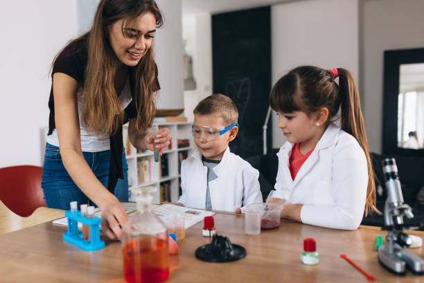 istock children do chemical experiments at home 1312747344