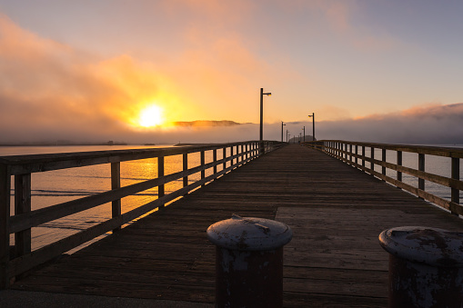 Beautiful sunrise over sea coast. Viewed from Beachfront park in Crescent City, California