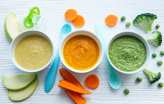 Baby food, assortment of fruit and vegetable puree, flat lay, top view