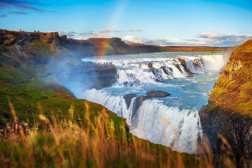 Gullfoss waterfall, also known as the Golden Falls, and the Olfusa river in southwest Iceland with a rainbow.