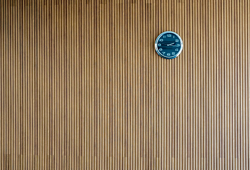 Modern wooden wall with a clock