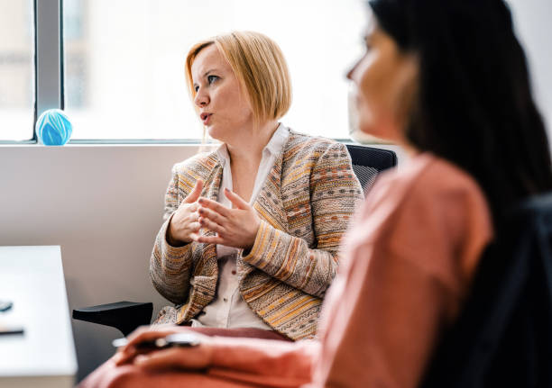istock Businesswomen Discussing In The Office 1312759073